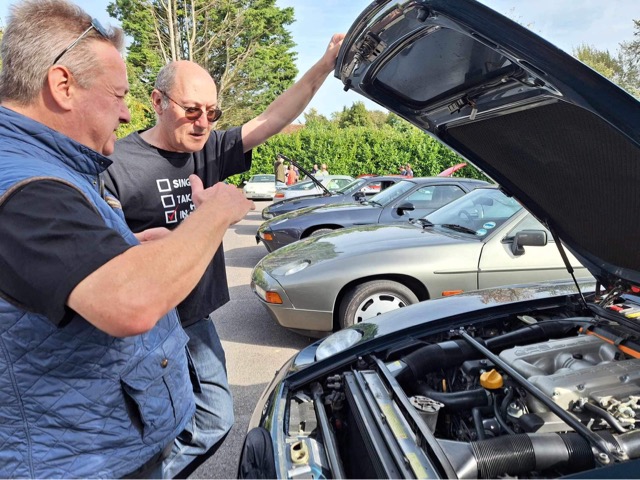 Porsche 928 Bonnet up, 32v V8 on display